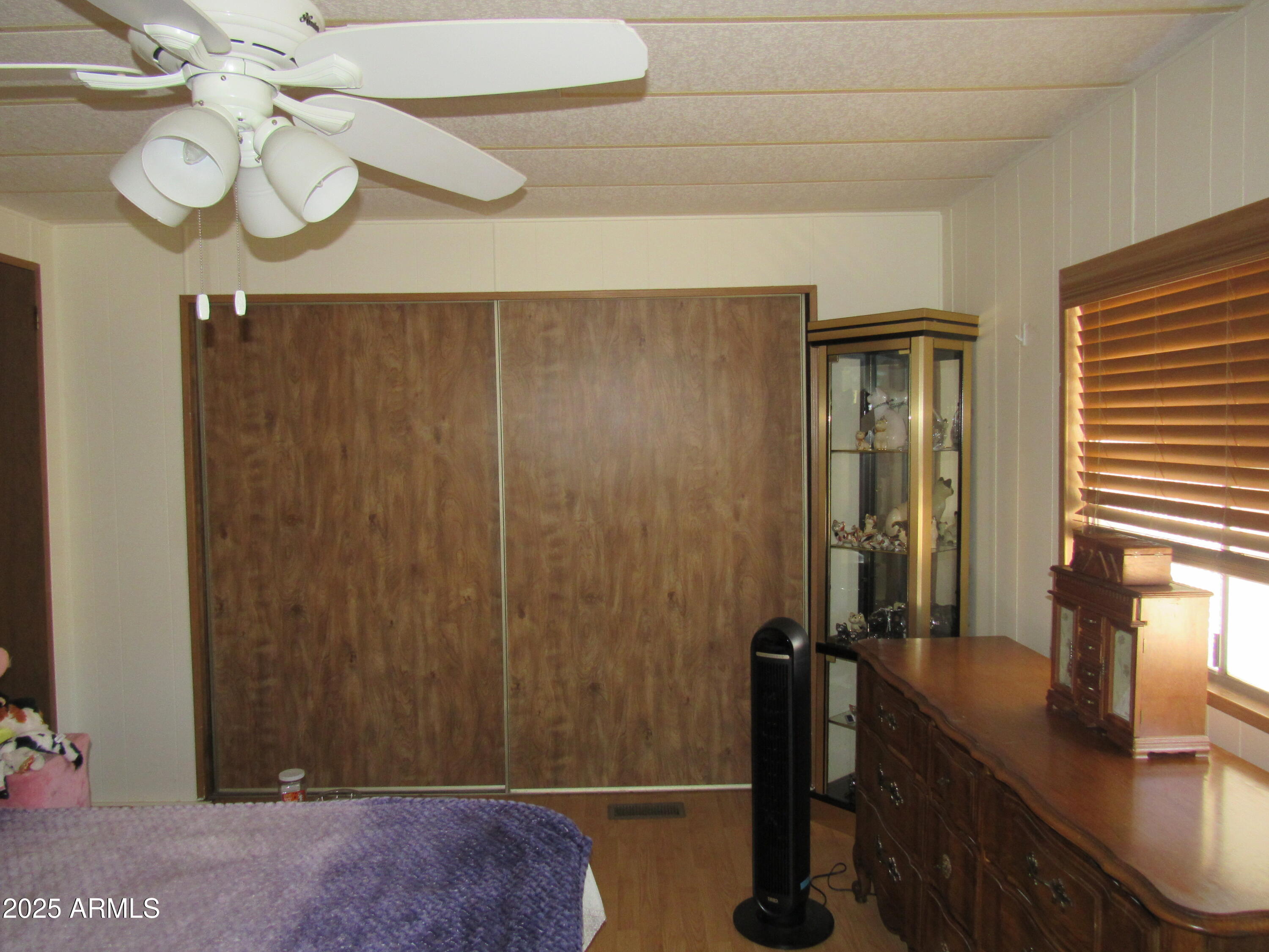 3411 South Camino Seco, Unit 207 Tucson, AZ 85730 - Photo 20 of 25 a view of a hallway with chandelier