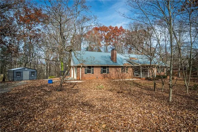 front view of house with a yard