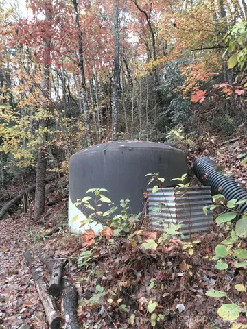 a view of a backyard of the house