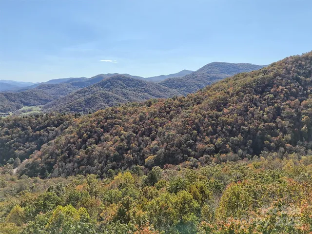 a view of a large mountains with a mountain in the background