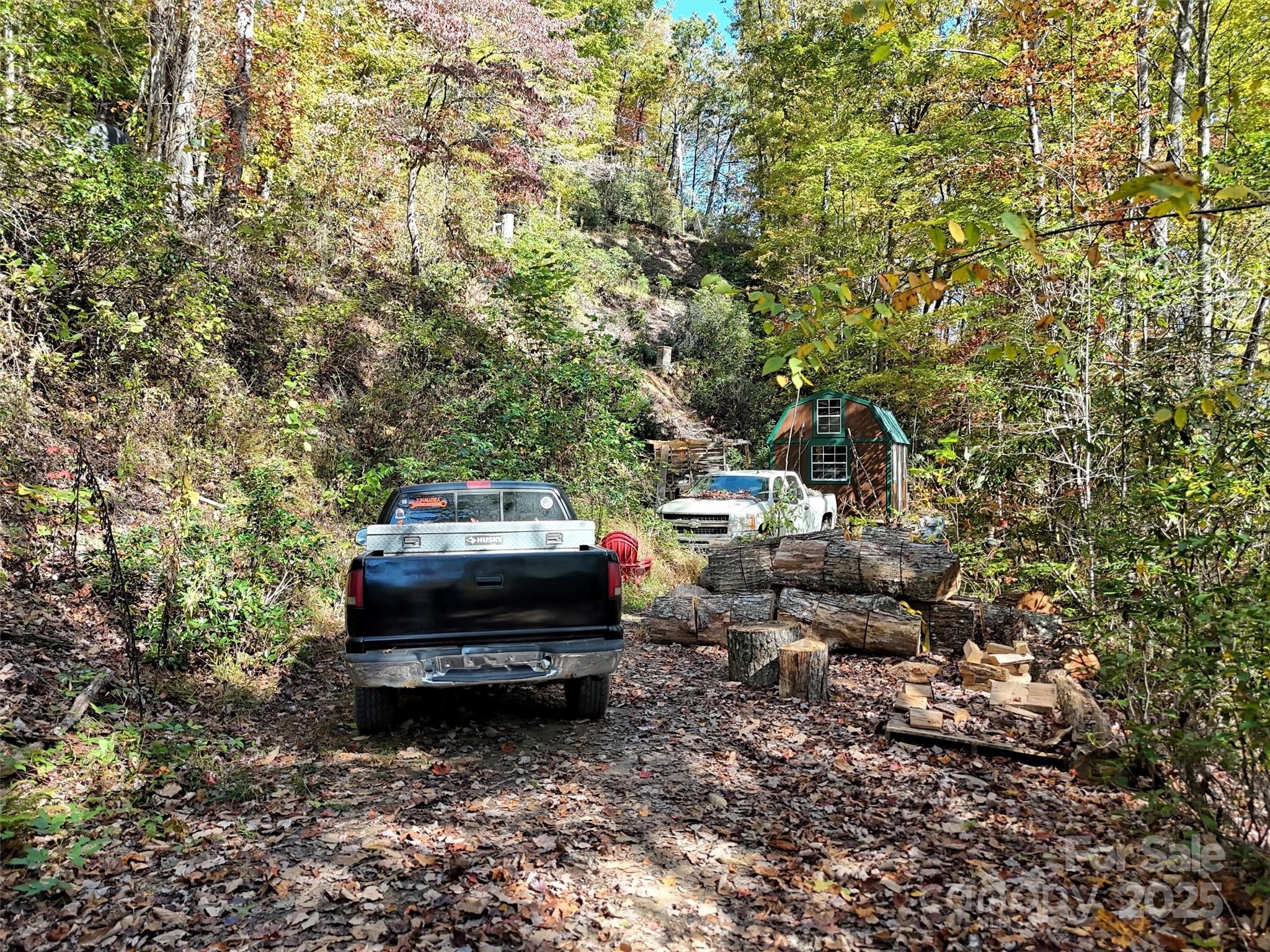 0 Mack Luke Road, Unit 7 Whittier, NC 28789 - Photo 7 of 25 a car parked in front of a house