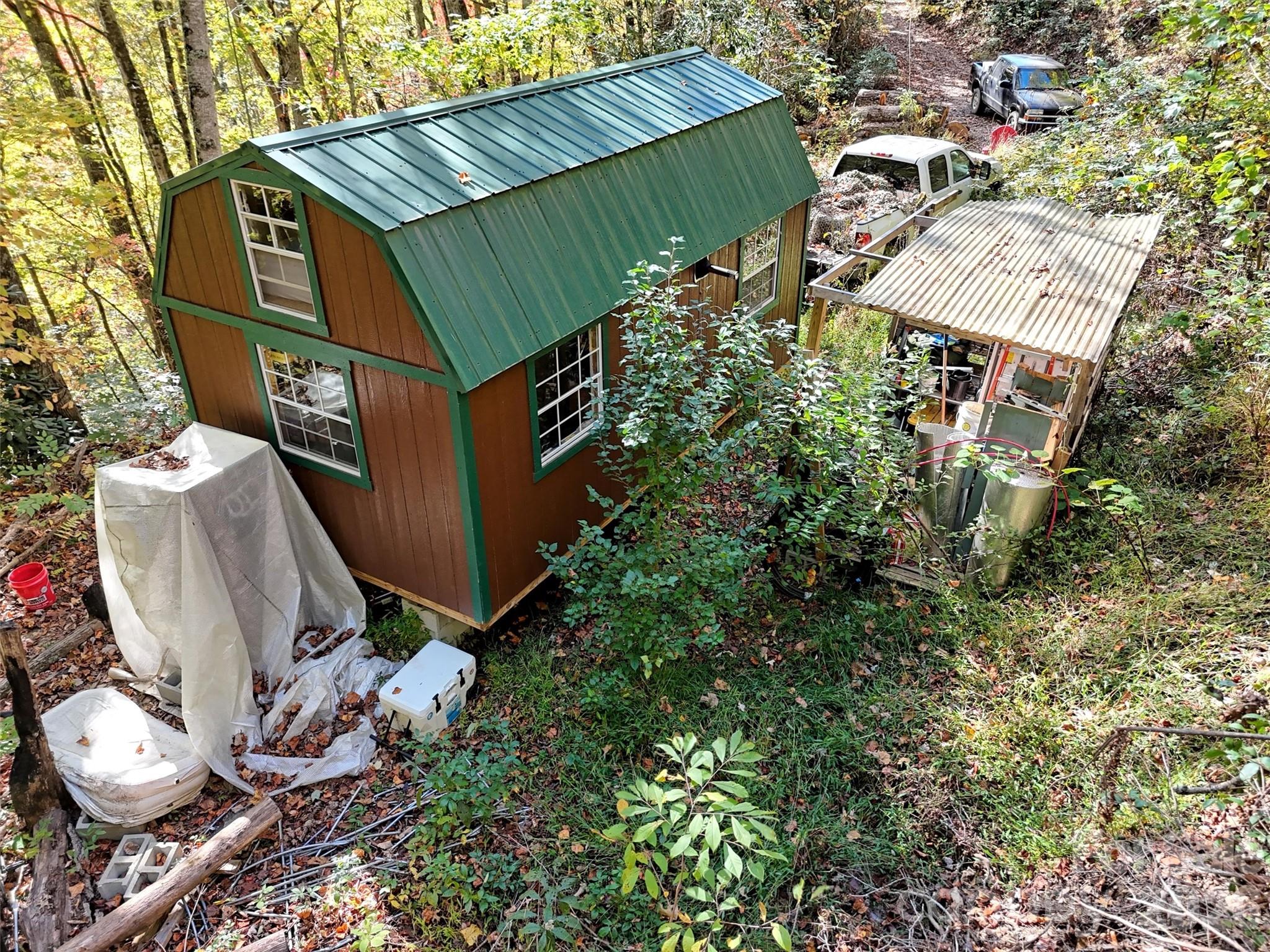 0 Mack Luke Road, Unit 7 Whittier, NC 28789 - Photo 9 of 25 an aerial view of a house with yard