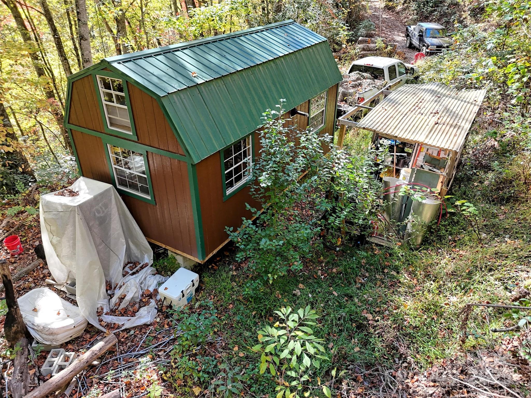 0 Mack Luke Road, Unit 7 Whittier, NC 28789 - Photo 9 of 25 an aerial view of a house with yard