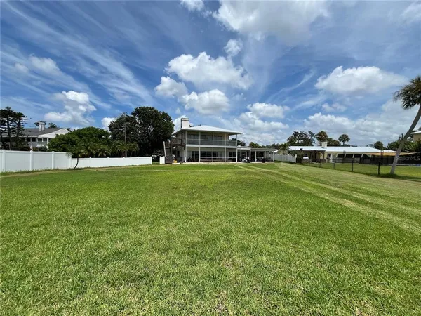 a view of a house with a big yard