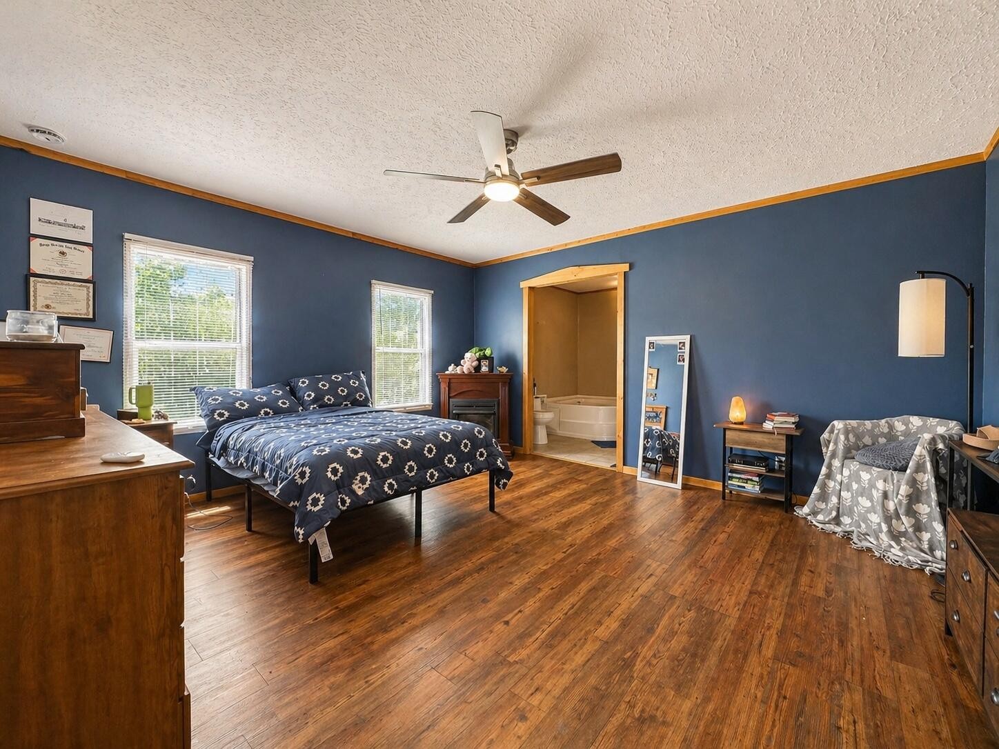 145 Rogers Road Birchwood, TN 37308 - Photo 15 of 21 a bedroom with a bed and wooden floor