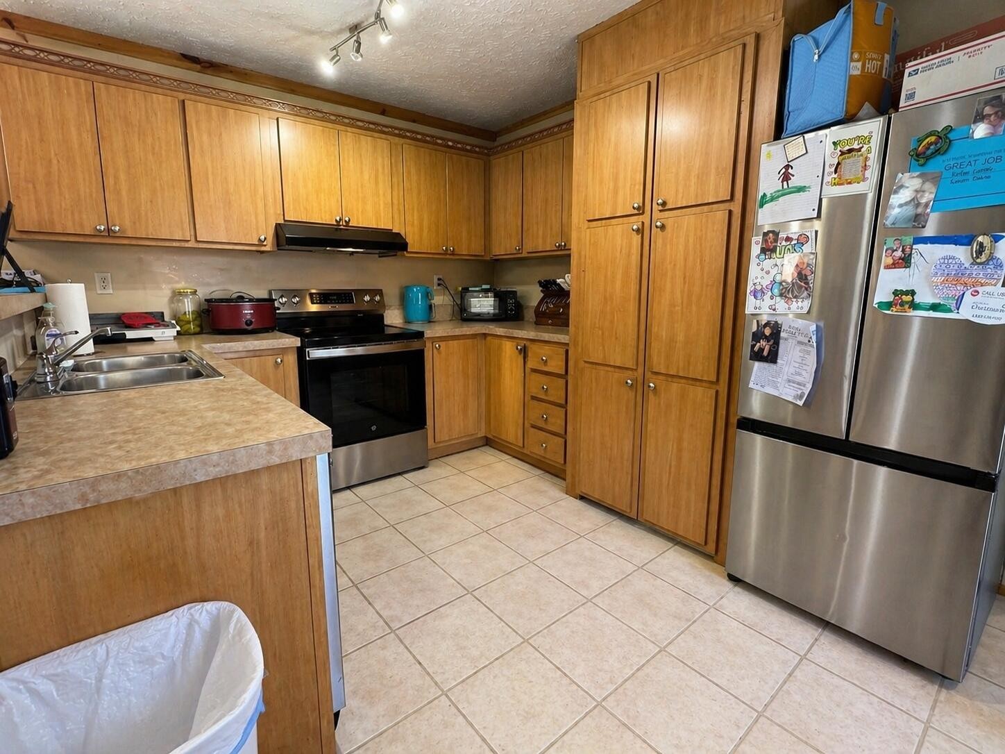 145 Rogers Road Birchwood, TN 37308 - Photo 9 of 21 a kitchen with a refrigerator sink and stove