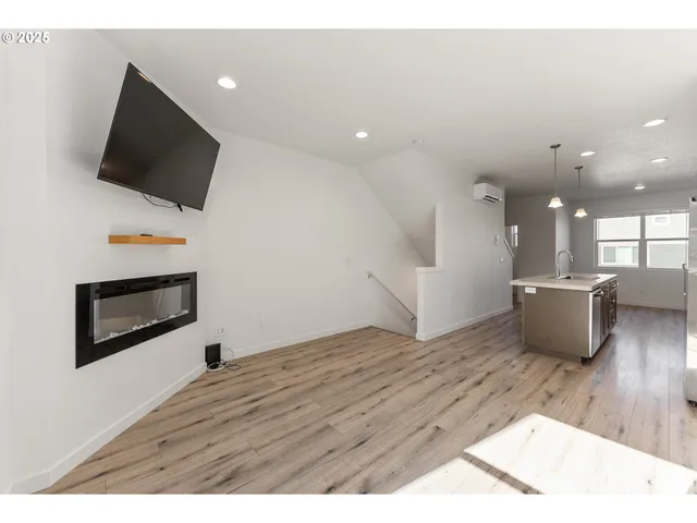 a view of kitchen with microwave and stove