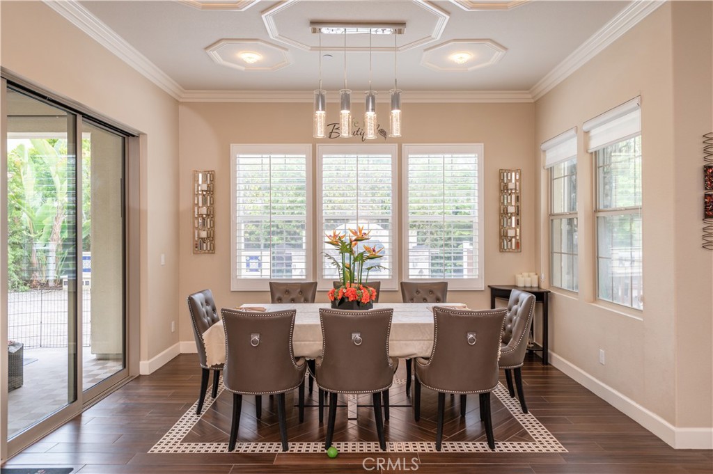 126 Nickel Irvine, CA 92618 - Photo 14 of 59 a view of a dining room with furniture window and wooden floor