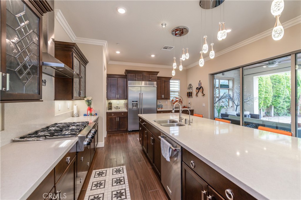 126 Nickel Irvine, CA 92618 - Photo 19 of 59 a kitchen with stainless steel appliances granite countertop a sink stove and refrigerator