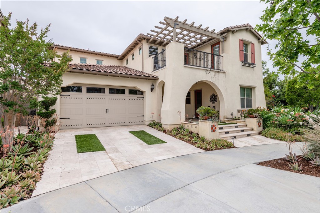 126 Nickel Irvine, CA 92618 - Photo 2 of 59 a front view of a house with garden