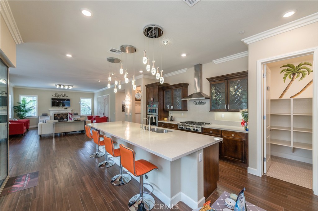 126 Nickel Irvine, CA 92618 - Photo 23 of 59 a large kitchen with a table and chairs in it
