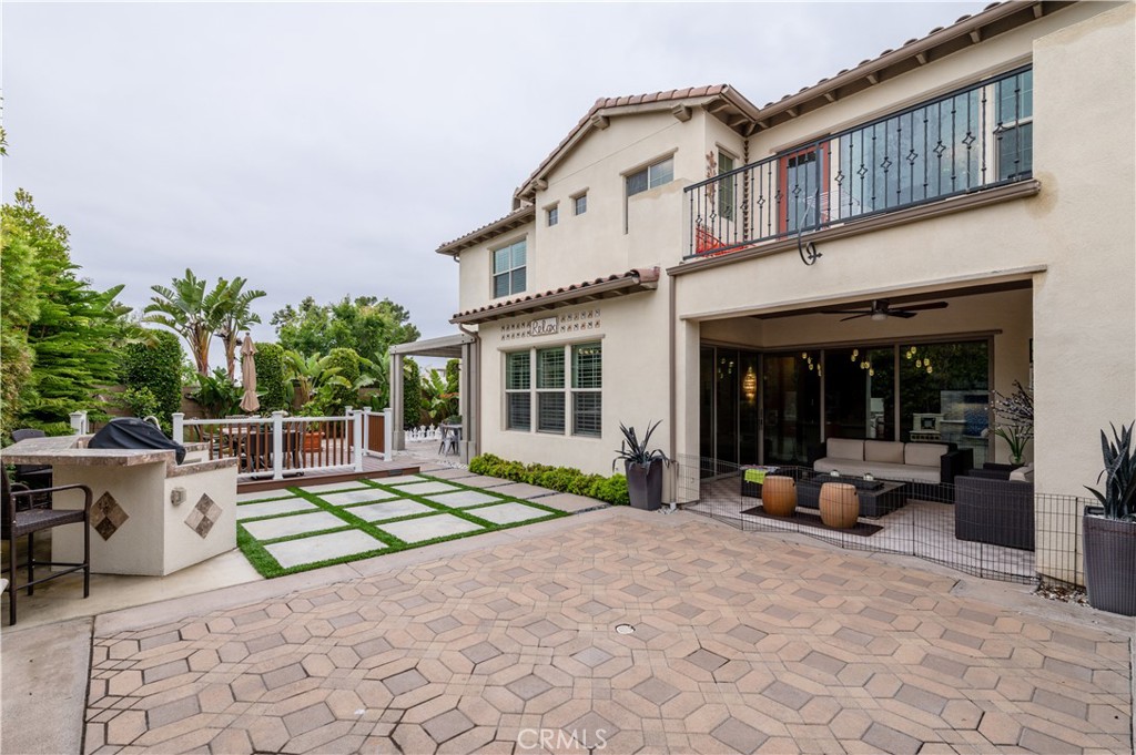 126 Nickel Irvine, CA 92618 - Photo 27 of 59 a building outdoor space with patio furniture and potted plants