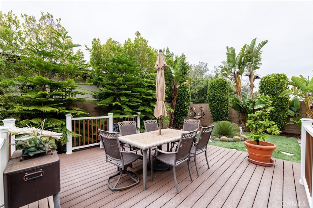 126 Nickel Irvine, CA 92618 - Photo 30 of 59 a view of a backyard with furniture and a garden