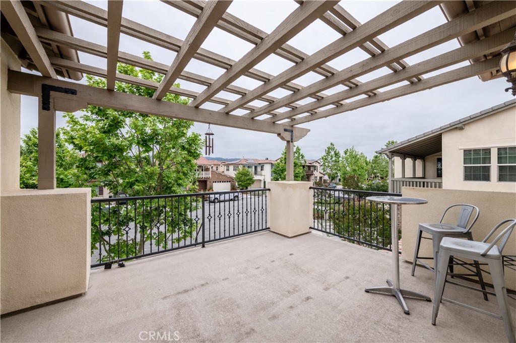 126 Nickel Irvine, CA 92618 - Photo 39 of 59 a view of a patio with a table and chairs