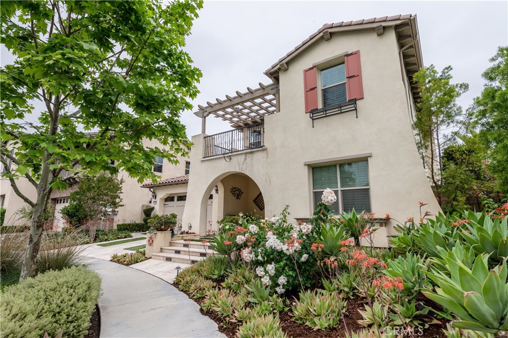 126 Nickel Irvine, CA 92618 - Photo 4 of 59 a front view of a house with garden