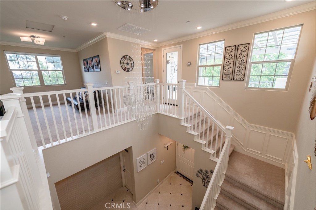 126 Nickel Irvine, CA 92618 - Photo 47 of 59 a view of entryway with stairs and wooden floor