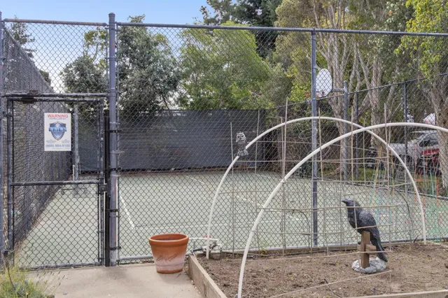 a view of a lake with a house in the background