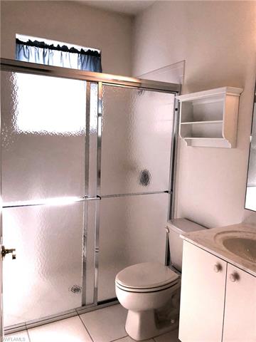 9008 Springview Loop Estero, FL 33928 - Photo 10 of 11 Guest bath with walk-in shower