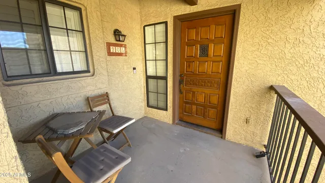 a view of a hallway with seating area