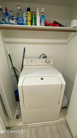 a utility room with washer and dryer