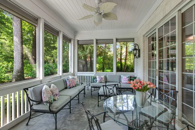 a spacious bedroom with a bed and a fireplace