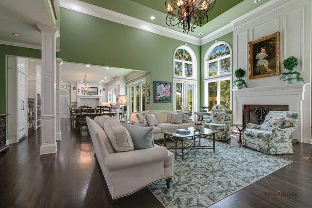 a view of a bathroom with a tub shower and mirror