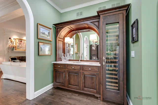 a bathroom with a granite countertop shower sink and toilet