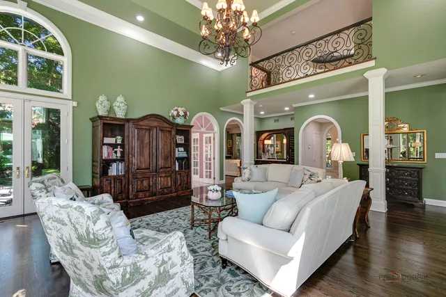 a view of a livingroom with furniture and windows