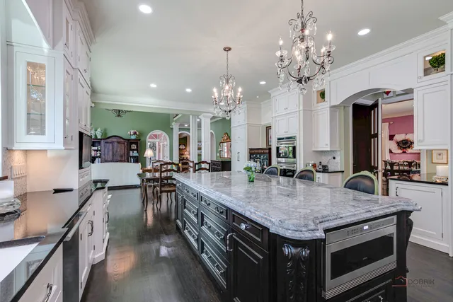 a bedroom with a bed window and couch