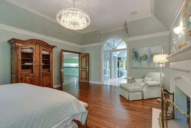 a view of a patio with couches table and chairs with potted plants