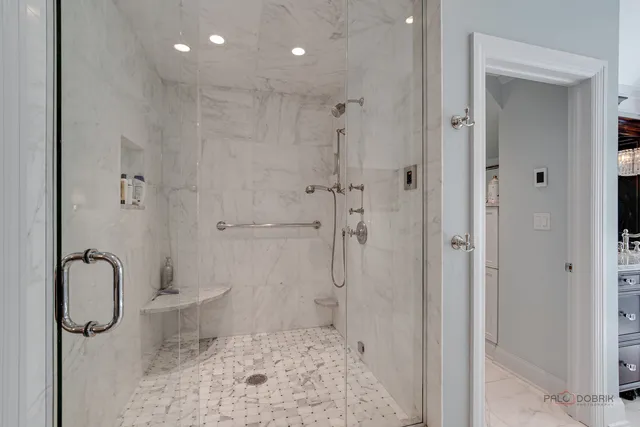 a view of a patio with couches table and chairs and potted plants