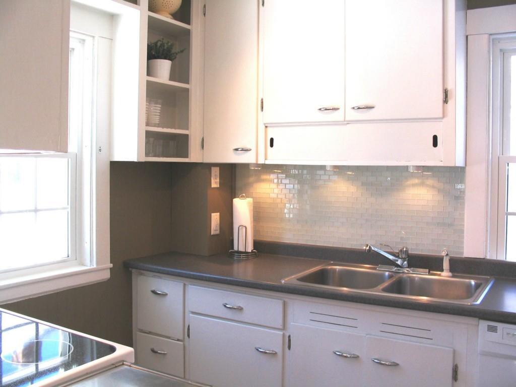 77 Academy Street Bath, ME 04530 - Photo 18 of 35 Updated kitchen with cabinets & open...