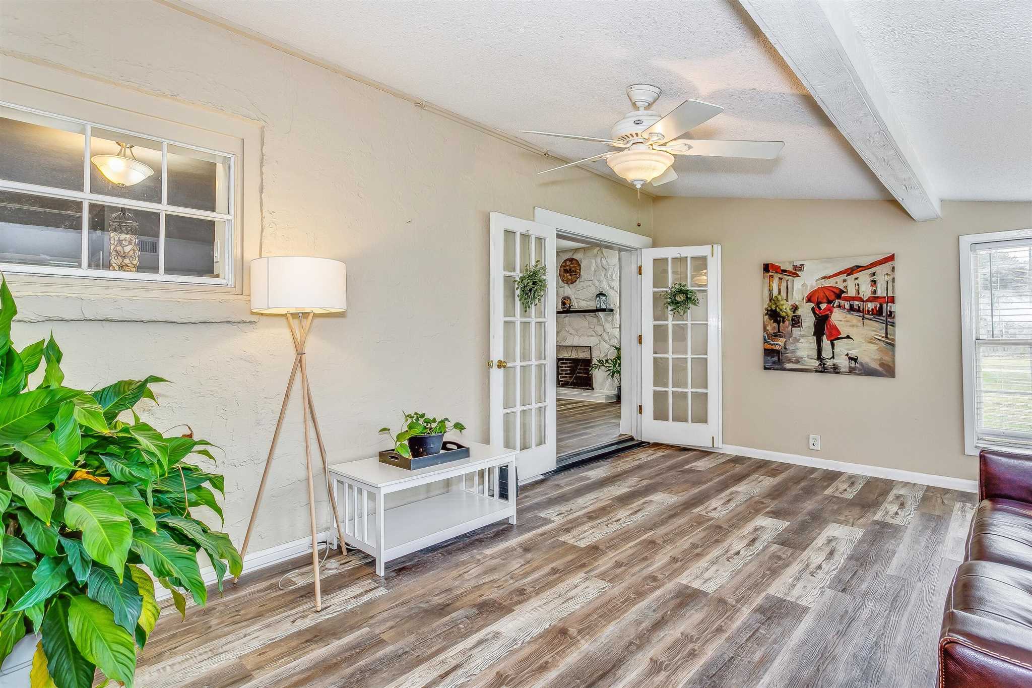 5926 Saufley Pines Road Pensacola, FL 32526 - Photo 12 of 35 a view of a livingroom with furniture a potted plant