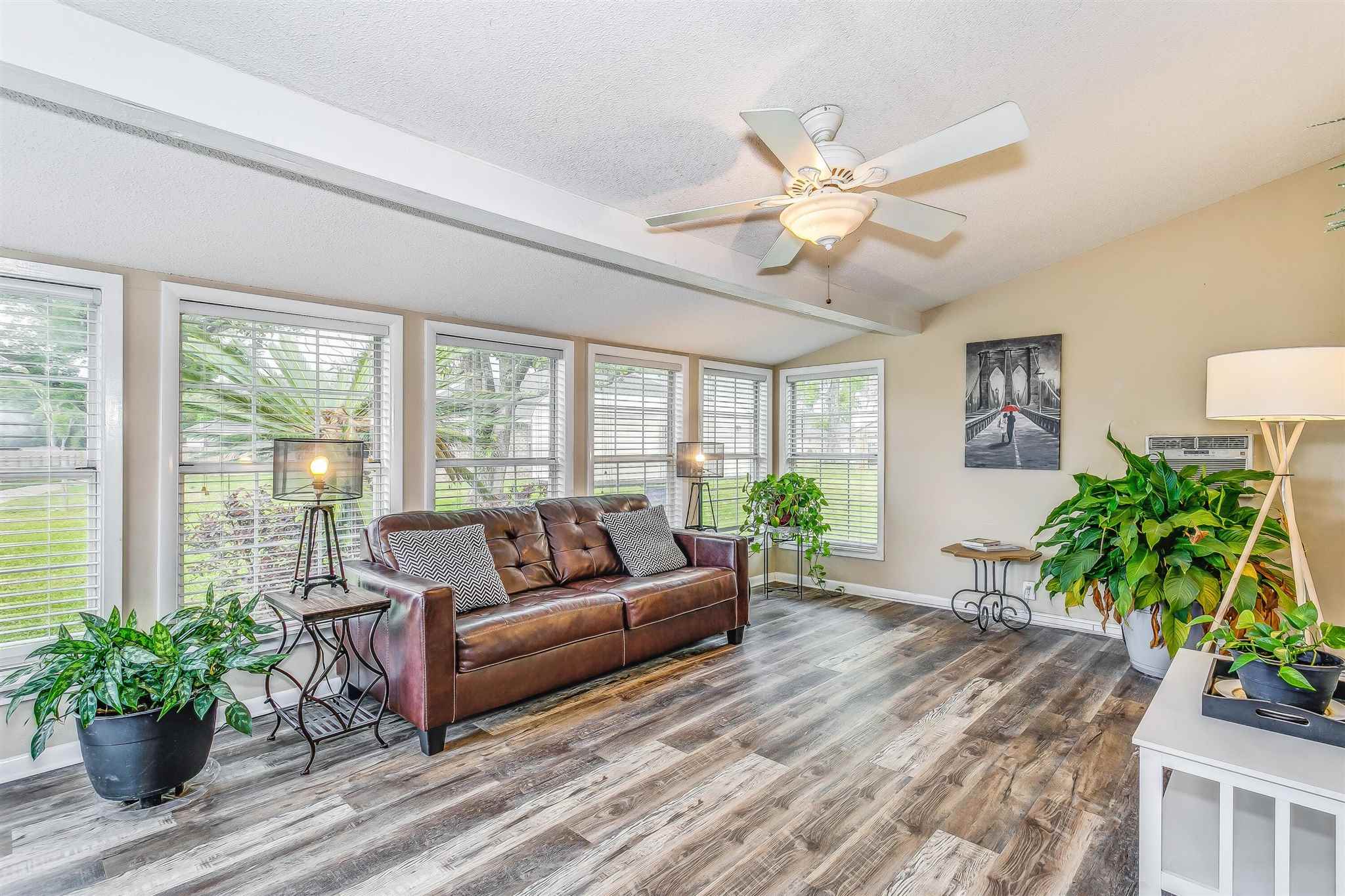 5926 Saufley Pines Road Pensacola, FL 32526 - Photo 13 of 35 a living room with furniture and a potted plant