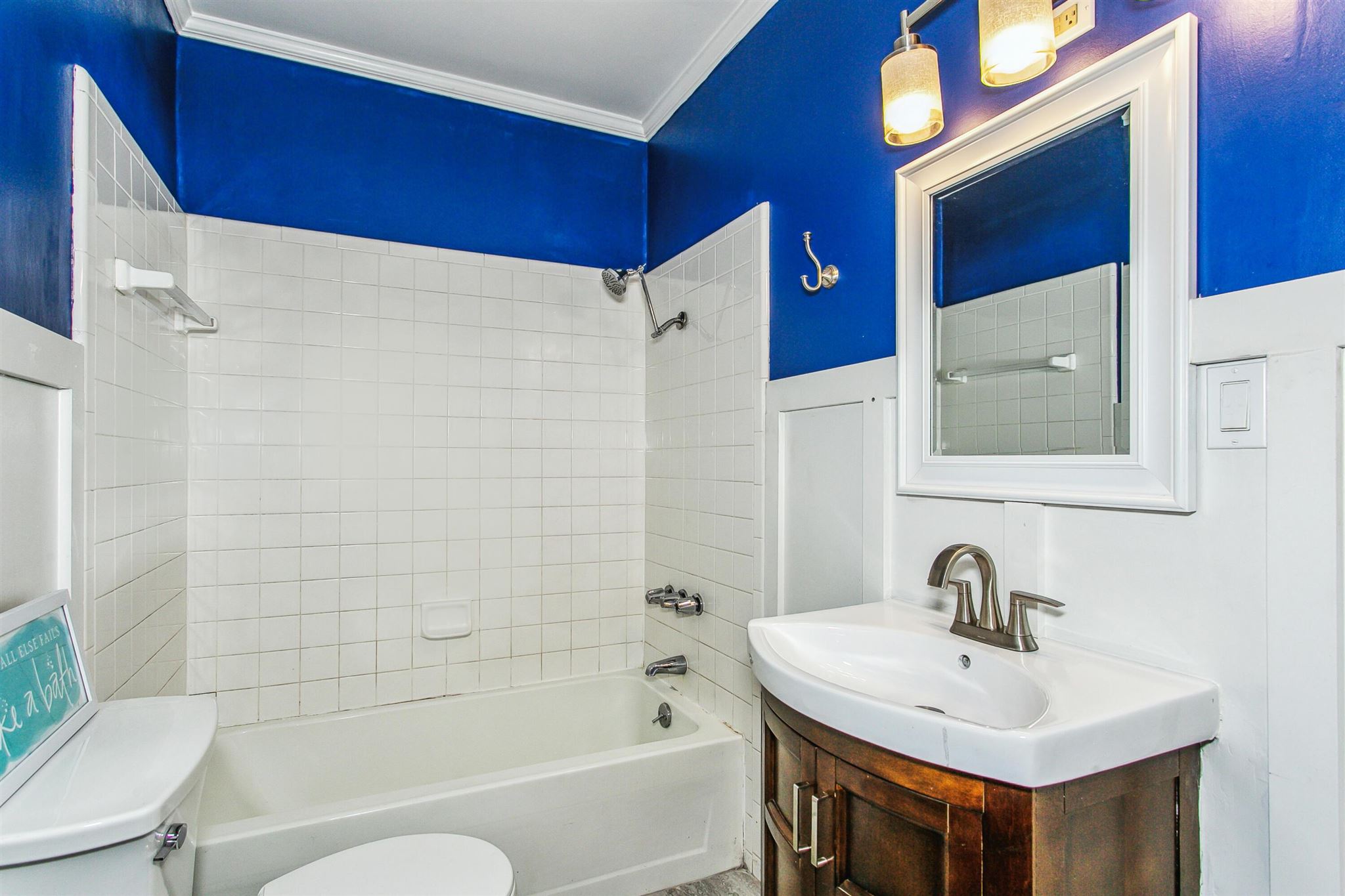 5926 Saufley Pines Road Pensacola, FL 32526 - Photo 16 of 35 a bathroom with a sink a toilet and shower