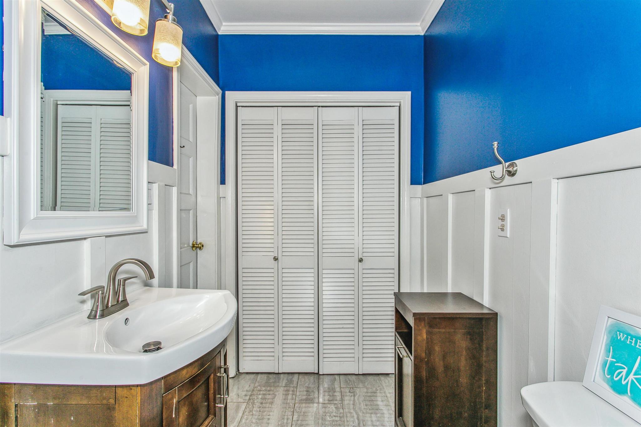 5926 Saufley Pines Road Pensacola, FL 32526 - Photo 17 of 35 a bathroom with a sink and a mirror