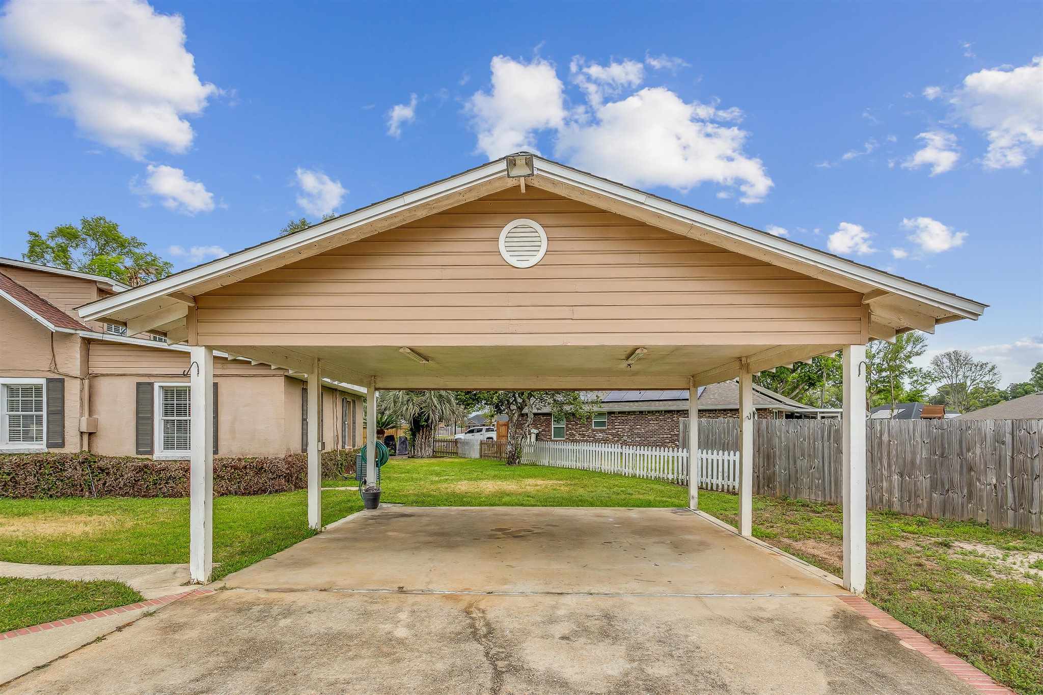 5926 Saufley Pines Road Pensacola, FL 32526 - Photo 4 of 35 a view of a backyard of a house