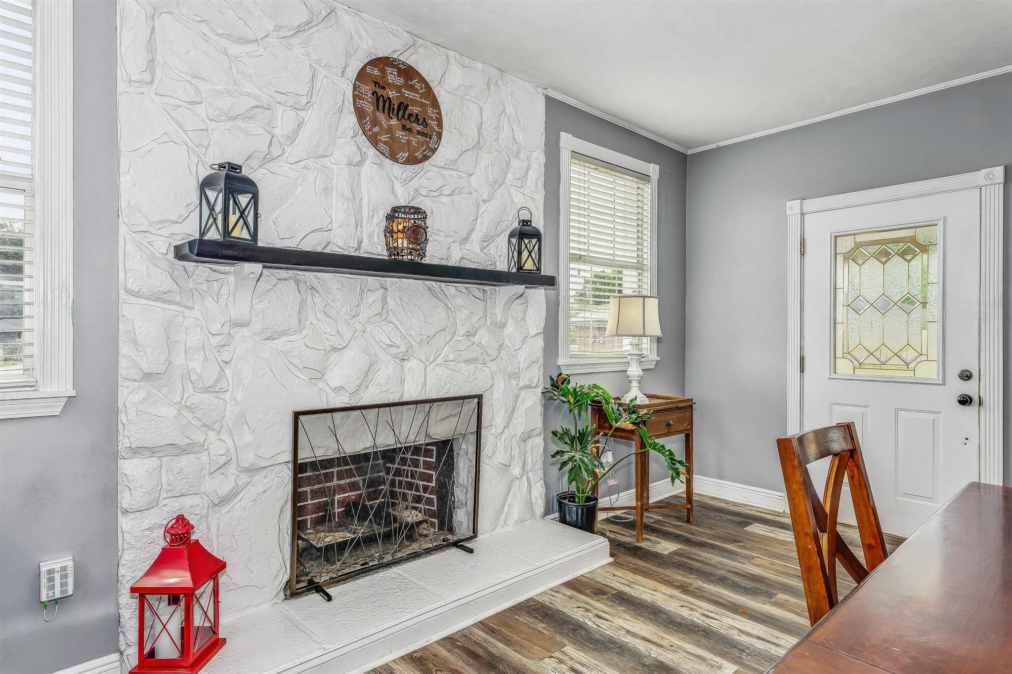 5926 Saufley Pines Road Pensacola, FL 32526 - Photo 8 of 35 a living room with furniture and a fireplace