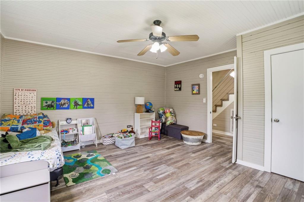 400 Sam Love Road Rocky Face, GA 30740 - Photo 26 of 29 a living room with furniture and a wooden floor