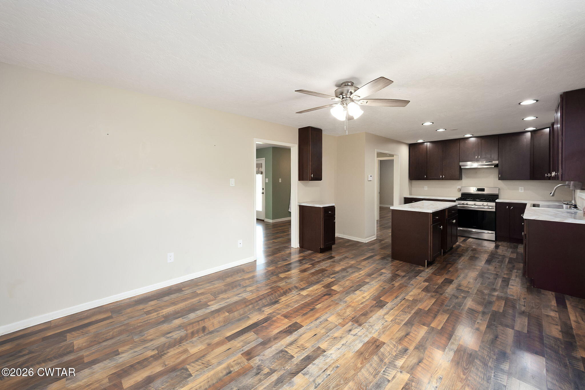 306 Jim Jackson Road Humboldt, TN 38343 - Photo 15 of 29 a view of kitchen with refrigerator microwave and stove