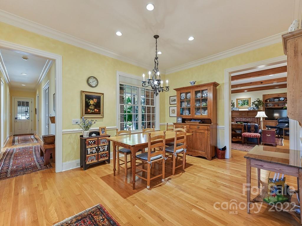 2236 Overhill Road Charlotte, NC 28211 - Photo 15 of 48 a view of a dining room with furniture window and wooden floor