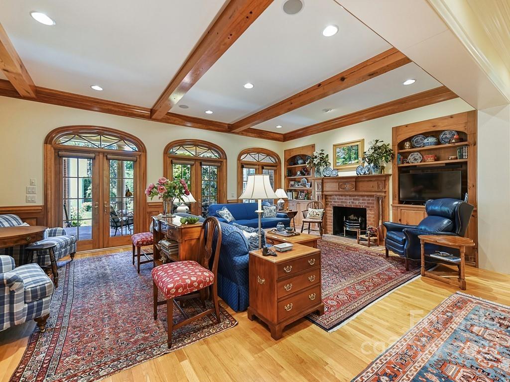 2236 Overhill Road Charlotte, NC 28211 - Photo 18 of 48 a living room with furniture fireplace and rug