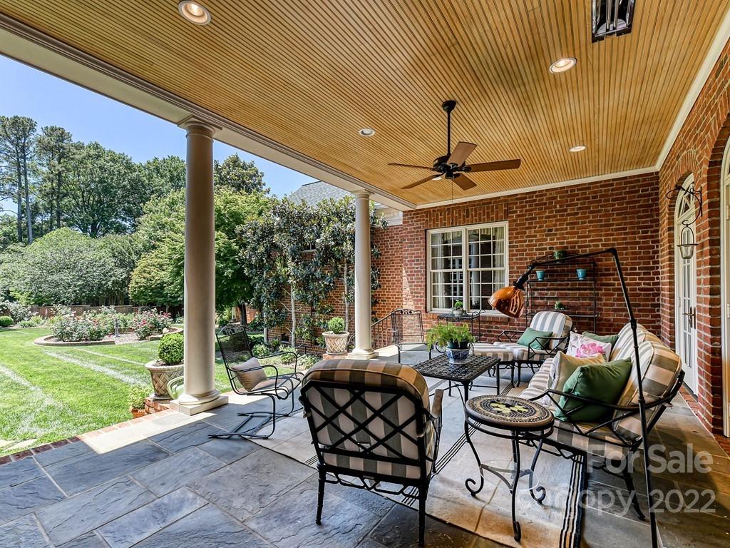 2236 Overhill Road Charlotte, NC 28211 - Photo 38 of 48 a living room with patio furniture and garden