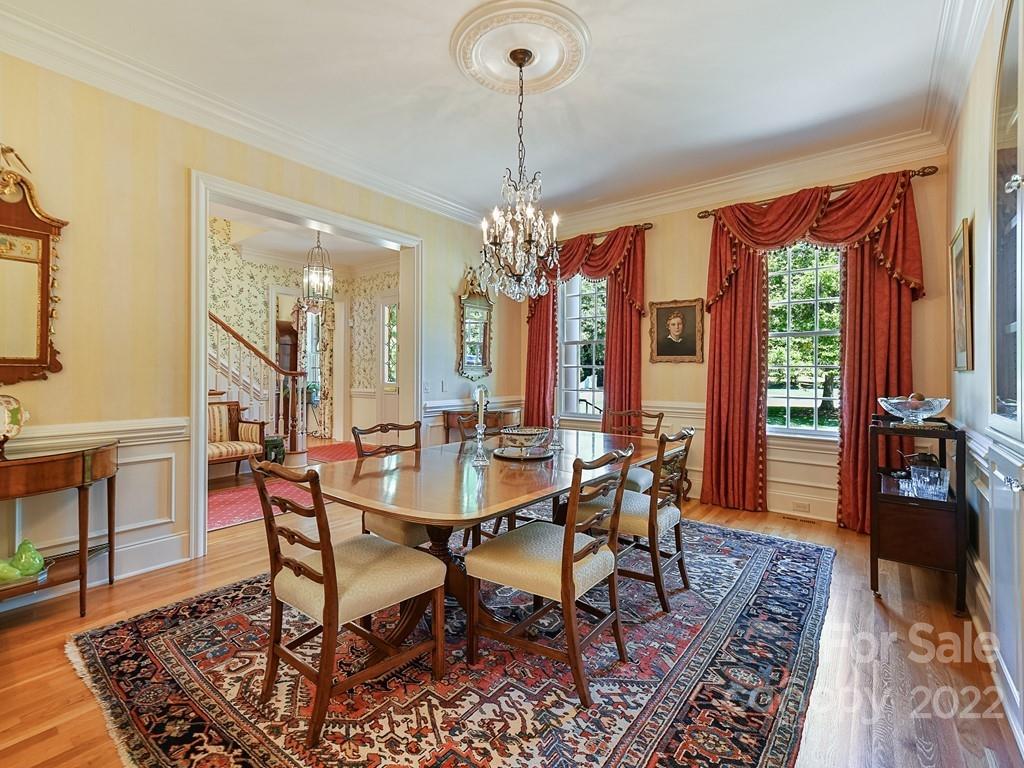 2236 Overhill Road Charlotte, NC 28211 - Photo 8 of 48 a view of a dining room with furniture window and wooden floor