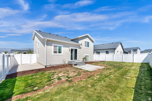 6120 North Sheps Ridge Road Eagle Mountain, UT 84005 - Photo 41 of 43 Fully fenced backyard with concrete patio