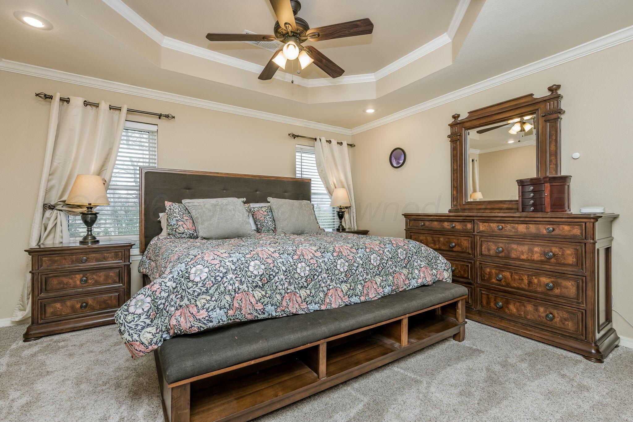 15812 Outback Trail Amarillo, TX 79118 - Photo 15 of 25 a bedroom with a bed and a dresser