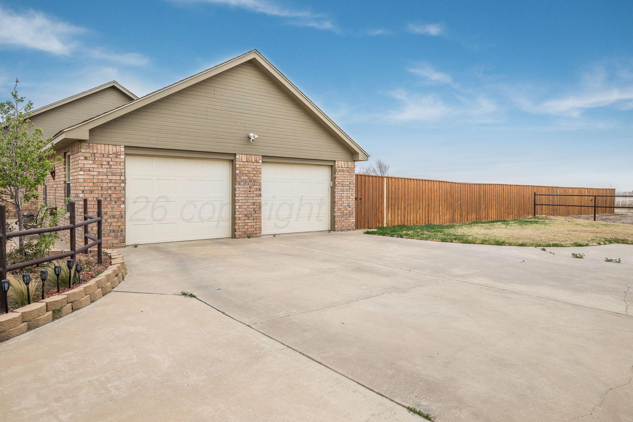 15812 Outback Trail Amarillo, TX 79118 - Photo 24 of 25 front view of a house with a garage