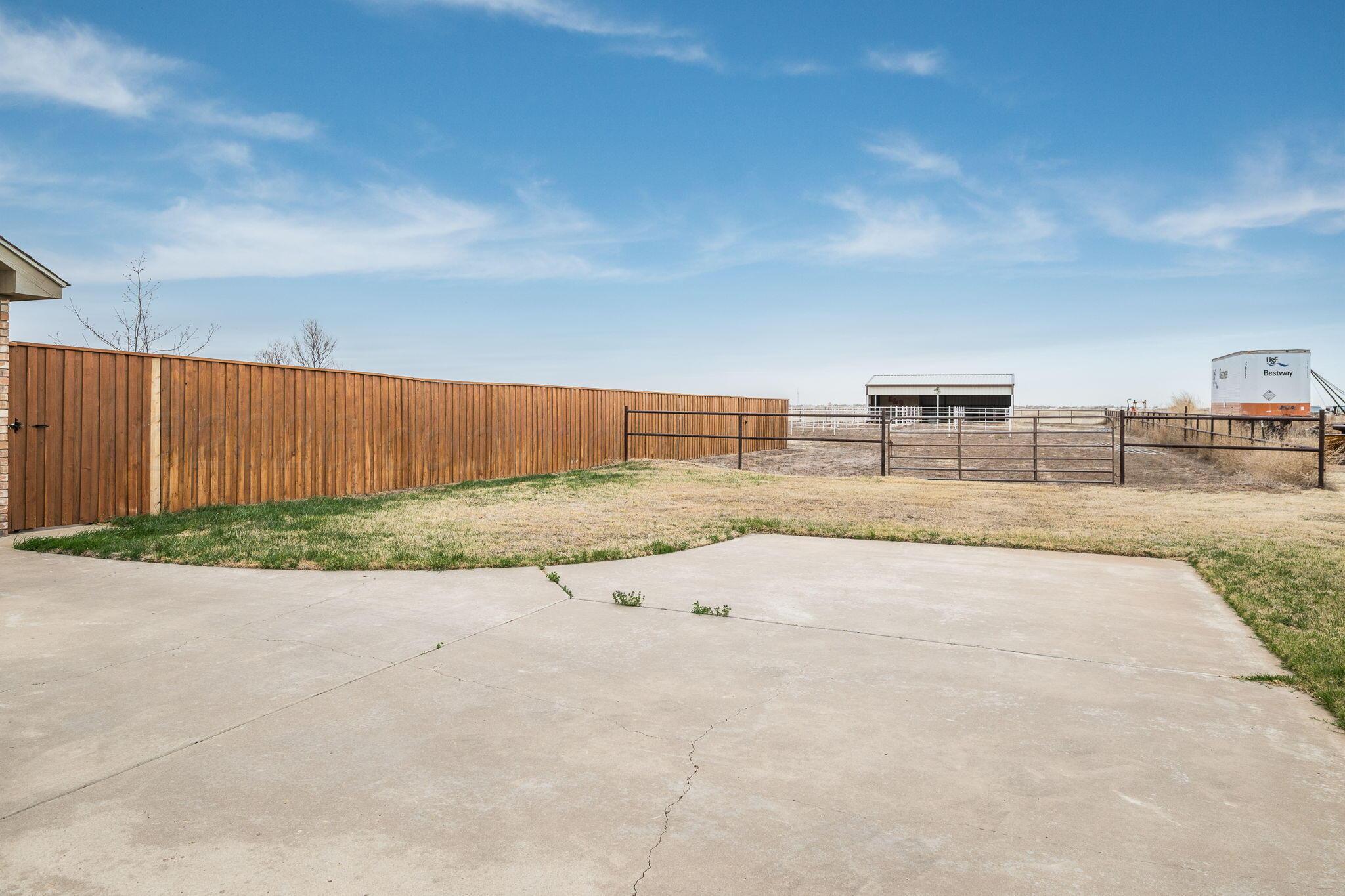 15812 Outback Trail Amarillo, TX 79118 - Photo 25 of 25 a view of a terrace hall with wooden fence