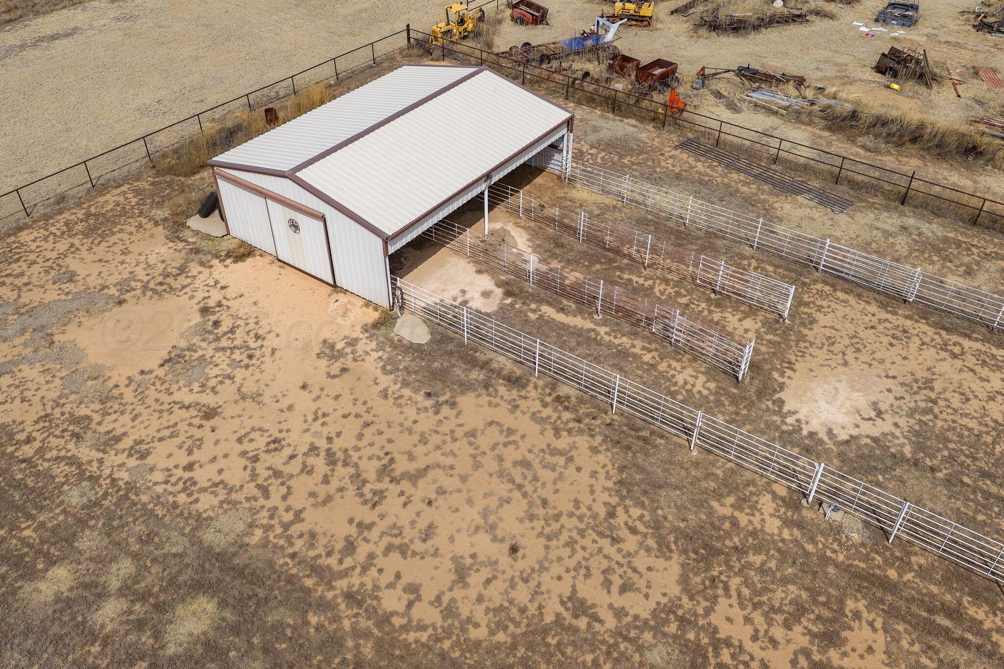 15812 Outback Trail Amarillo, TX 79118 - Photo 7 of 25 a view of a dry yard with wooden fence