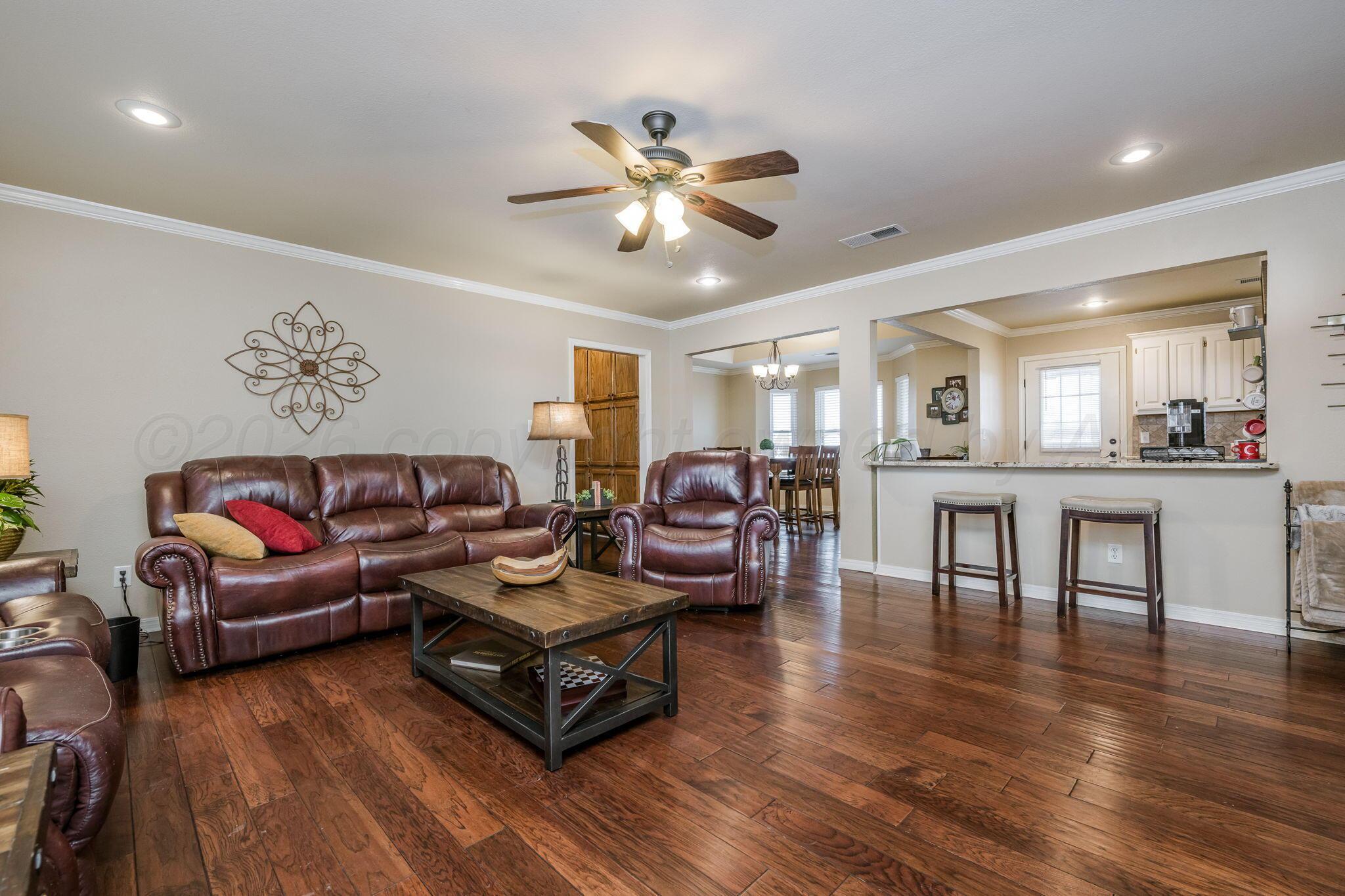 15812 Outback Trail Amarillo, TX 79118 - Photo 8 of 25 a living room with furniture and wooden floor